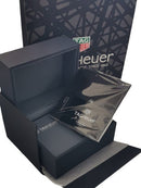 Caixa, estojo, certificado e manual completos da Tag Heuer.